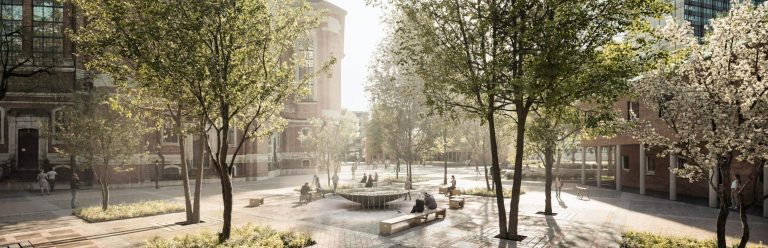 Der Kirchplatz des Michel nach der Umgestaltung. Zu sehen sind Sitzbänke, Bäume und der Brunnen.