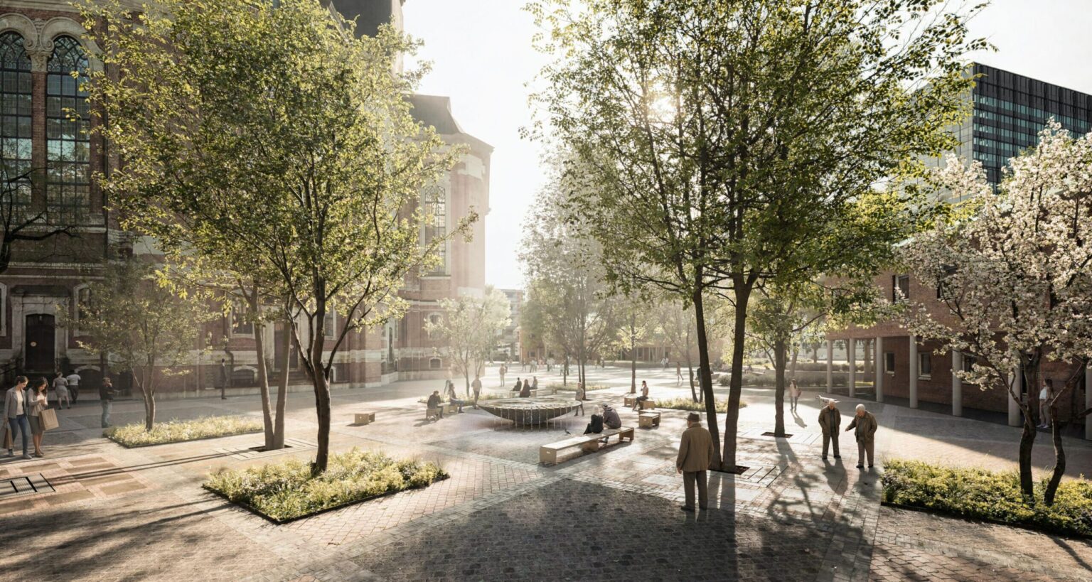 Der Kirchplatz des Michel nach der Umgestaltung. Zu sehen sind Sitzbänke, Bäume und der Brunnen.
